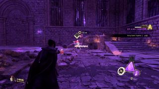 Forspoken fighting enemies in a purple room