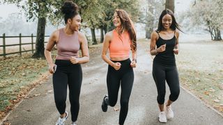 three women enjoying a run together
