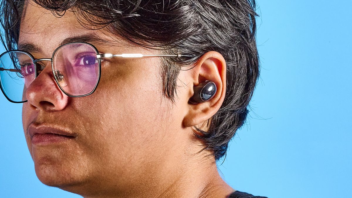 JBL Live Buds 4 earbuds in a person's ears