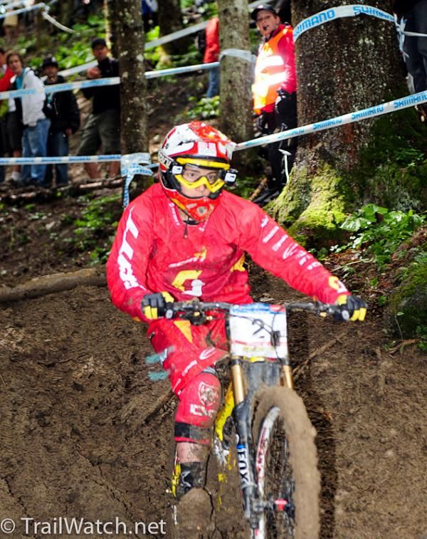 Floriane Pugin riding the mud and roots with reckless abandon.