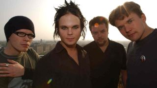 The Rasmus standing in front of an open sunny sky