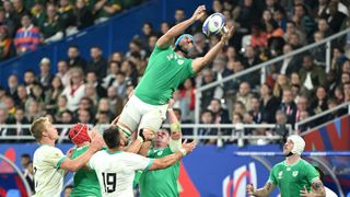 Tadhg Beirne is lifted at a line-out to catch the ball during a South Africa vs Ireland rugby match.