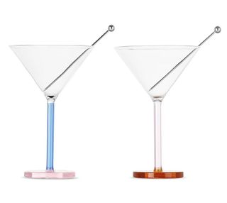 Two cocktail glasses with stirrers