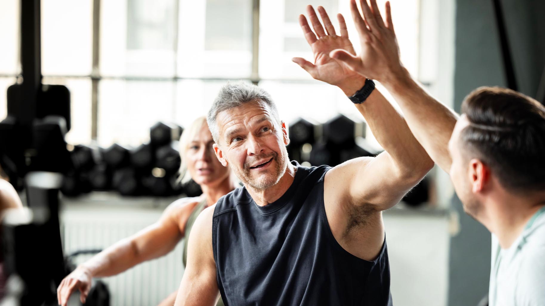 a photo of a middle aged man working out