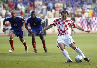 Milan Rapaić takes a penalty for Croatia against France at Euro 2004.