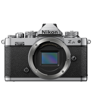 Nikon Z fc mirrorless camera on a white background