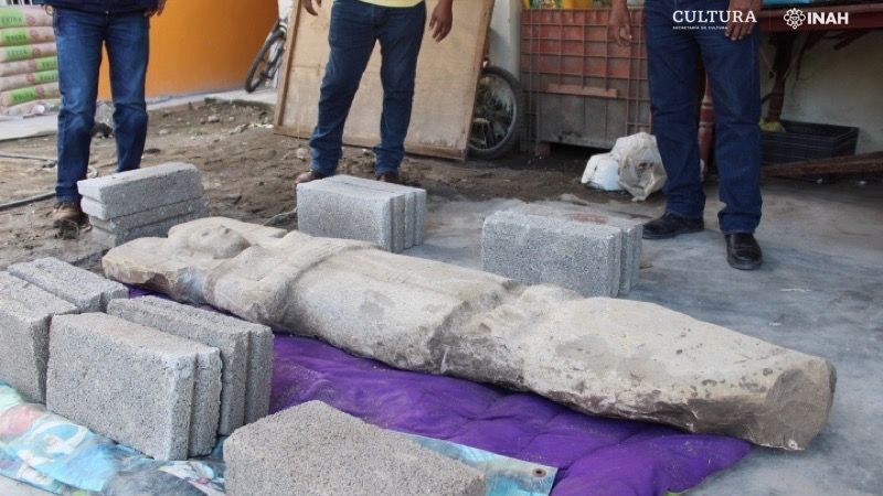 The limestone statue is 6.5 feet (2 meters) long.