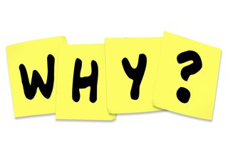 The word 'why' on post-it notes