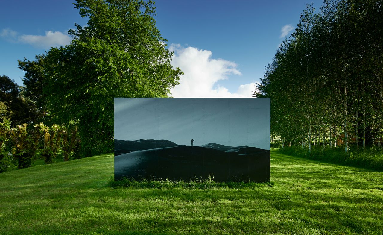 Katie Paterson, Inside this desert lie the tiniest grain of sand (2010). Photograph presented on a billboard  © Katie Paterson