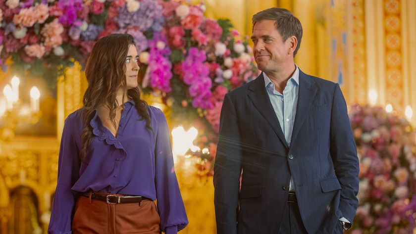 Michael Weatherly&#039;s Tony and Cote de Pablo&#039;s Ziva looking amusingly at each other within a decorated church