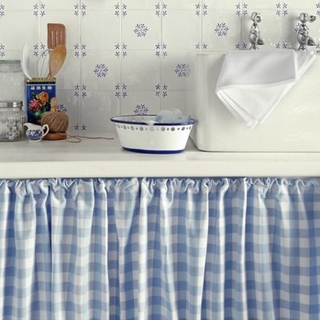 blue and white patterned sink skirt