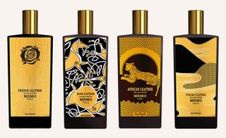 Four bottles of black and gold fragrance
