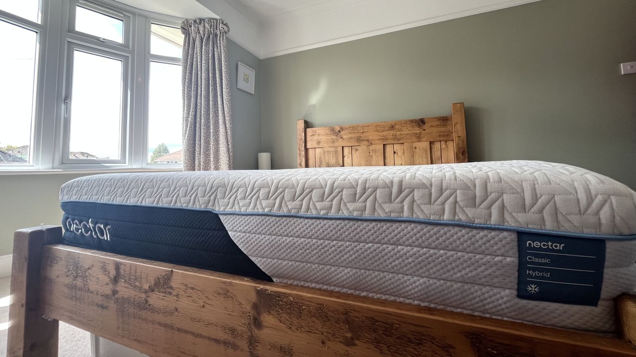 nectar classic hybrid on wooden bed frame