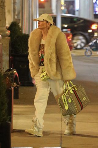 jennifer lopez carried two designer bags in new york city 2024