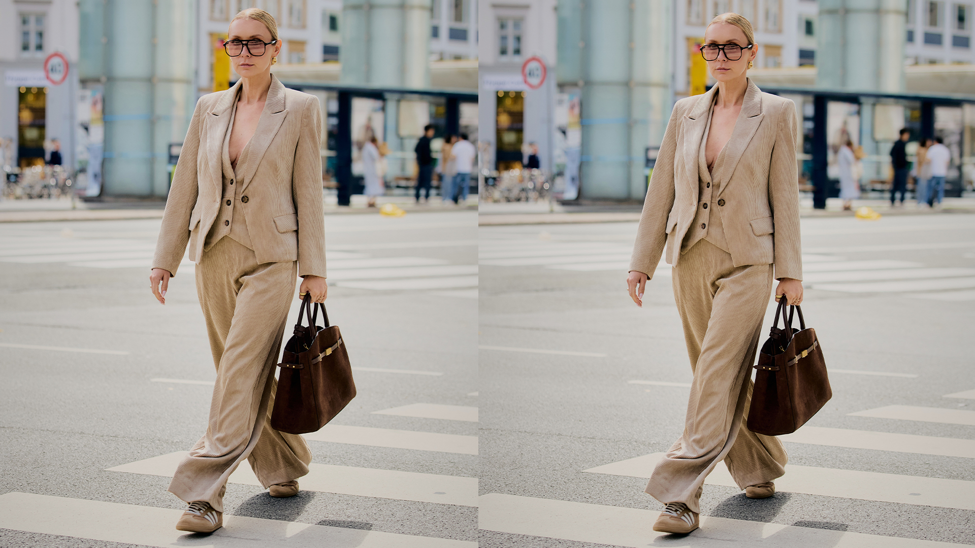 Woman wears tan breathable suit set and brown adidas sneakers while crossing the street. 