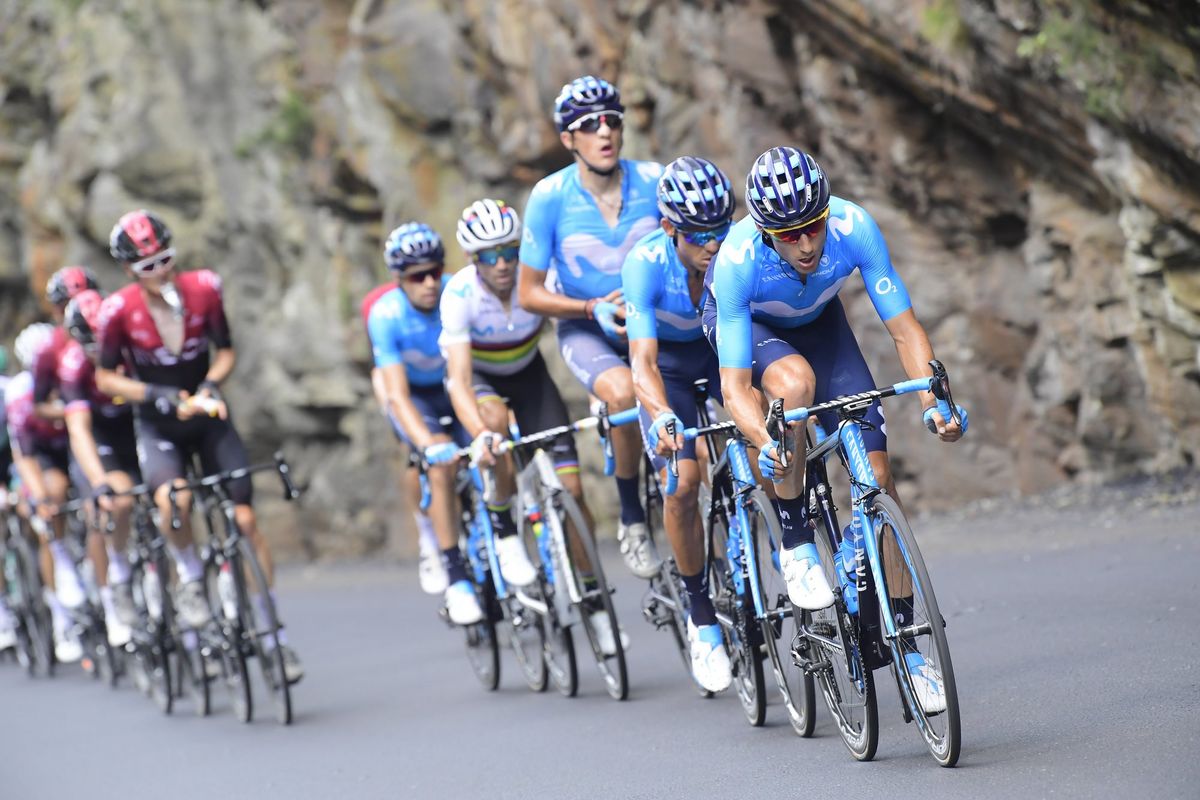 Movistar lead the peloton on the lower slopes of the Tourmalet