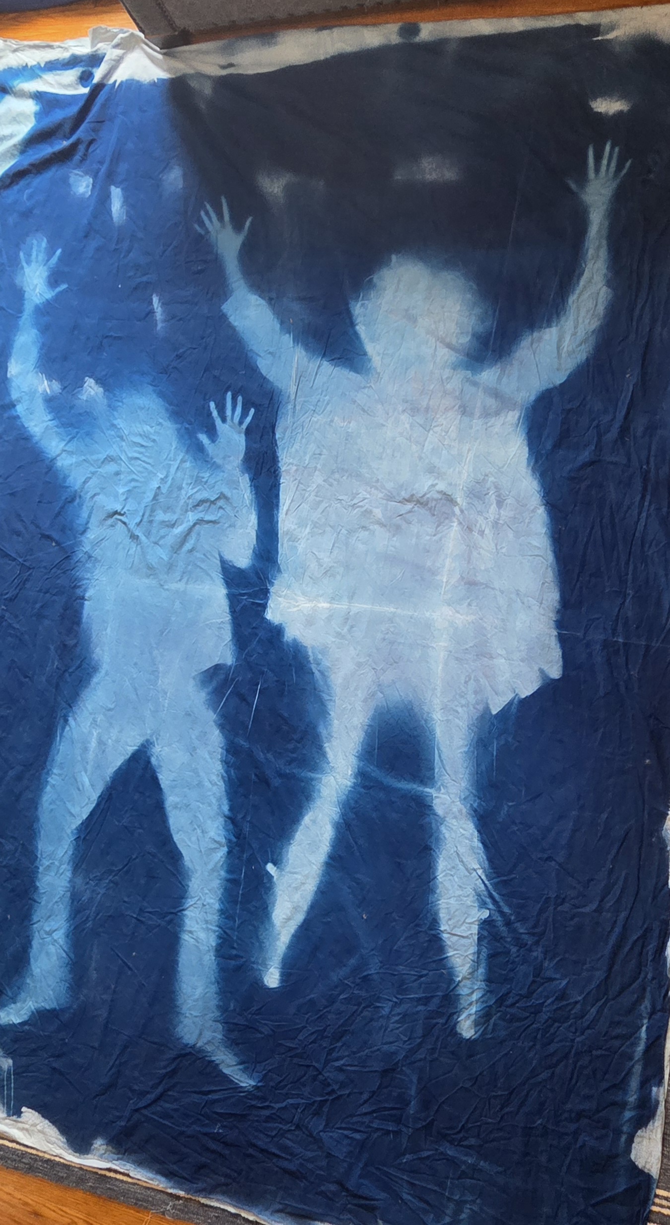A behind-the-scenes photo from creating what could be the world's largest cyanotype in Grand Rapids, Michigan