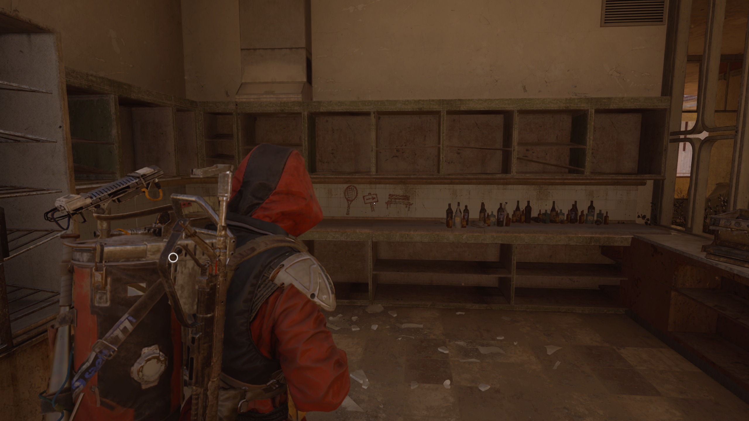 Arc Raiders Safe Harbor: A player looking at the kitchen area of the hotel restaurant, specifically drawing attention to symbols written on the wall.