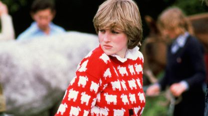 Princess Diana wearing the iconic black sheep sweater