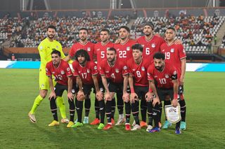 Egypt AFCON 2023 squad: Egypt players pose for a group photo ahead of the Africa Cup of Nations (CAN) 2024 group B football match between Egypt and Ghana at the Felix Houphouet-Boigny Stadium in Abidjan on January 18, 2024. (Photo by Issouf SANOGO / AFP) (Photo by ISSOUF SANOGO/AFP via Getty Images)