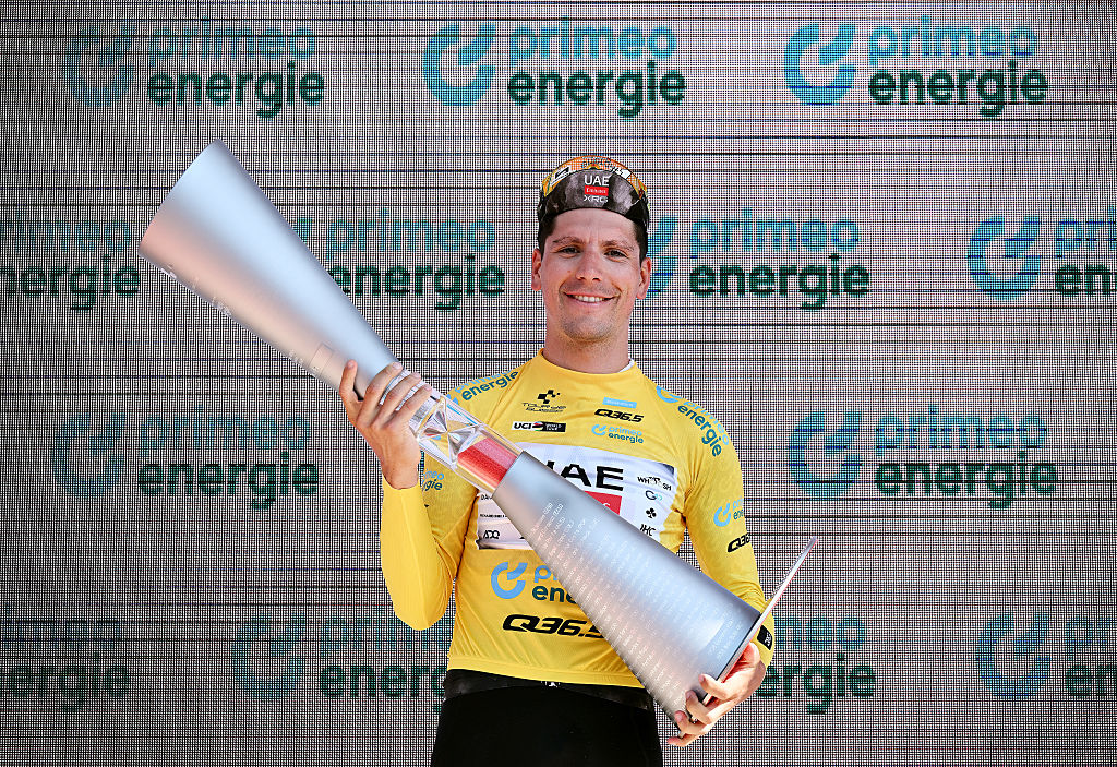 STOCKHUTTE, SWITZERLAND - JUNE 22: Joao Almeida of Portugal and UAE Team Emirates - XRG celebrates at podium as - Yellow leader jersey winner during the 88th Tour de Suisse 2025, Stage 8 a 10km individual time trial stage from Beckenried to Stockhutte 1268m / #UCIWT / on June 22, 2025 in Stockhutte, Switzerland. (Photo by Tim de Waele/Getty Images)