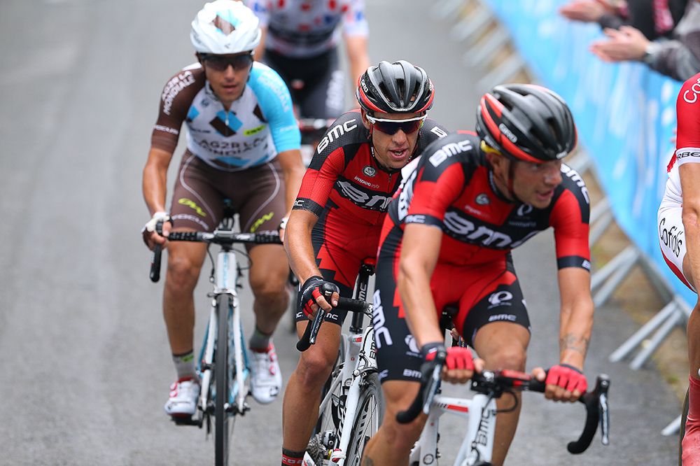 Richie Porte arrives at the finish after losing two minutes following a late flat.