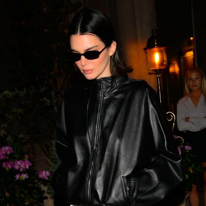 Kendall Jenner wears black Salomon sneakers on a hike in California.