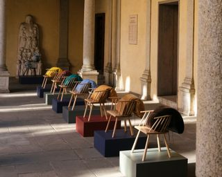 Loewe exhibition featuring Welsh stick chairs