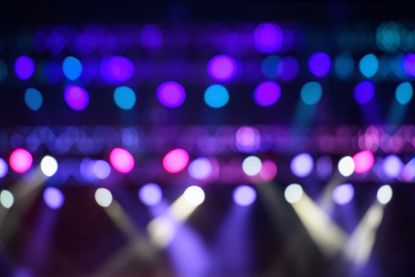 blurred lights over a concert stage