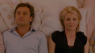 Jude Law and Cameron Diaz laying together in a bed in The Holiday