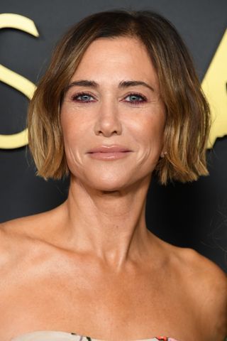 Kristen Wiig is pictured with burgundy eyeliner at Kristen Wiig arrives at the 2024 Governors Awards at Dolby Theatre on November 17, 2024 in Hollywood, California.