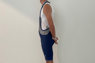 Cyclist wearing Lusso bib shorts from the side