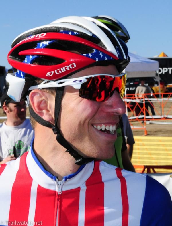 Jeremy Powers (Rapha Focus) having a laugh at the start as a spectator ran around with a "Lance is Clean" sign painted on his chest