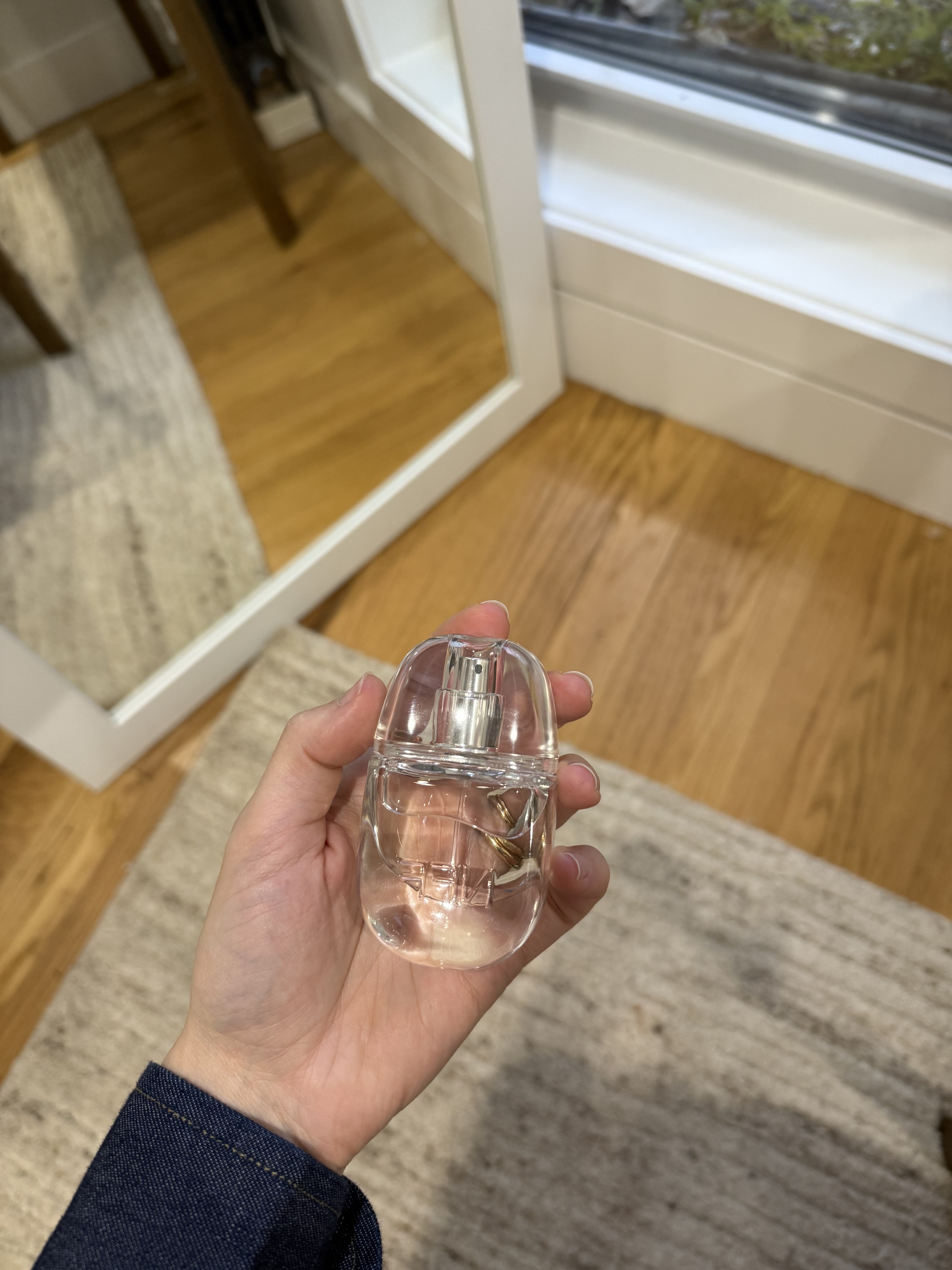 Photo of Jamie Schneider testing the No Fragrance Fragrance essence