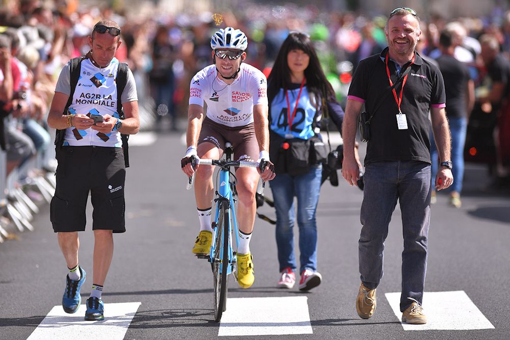 Pierre Latour in the white jersey of best young rider at Dauphine