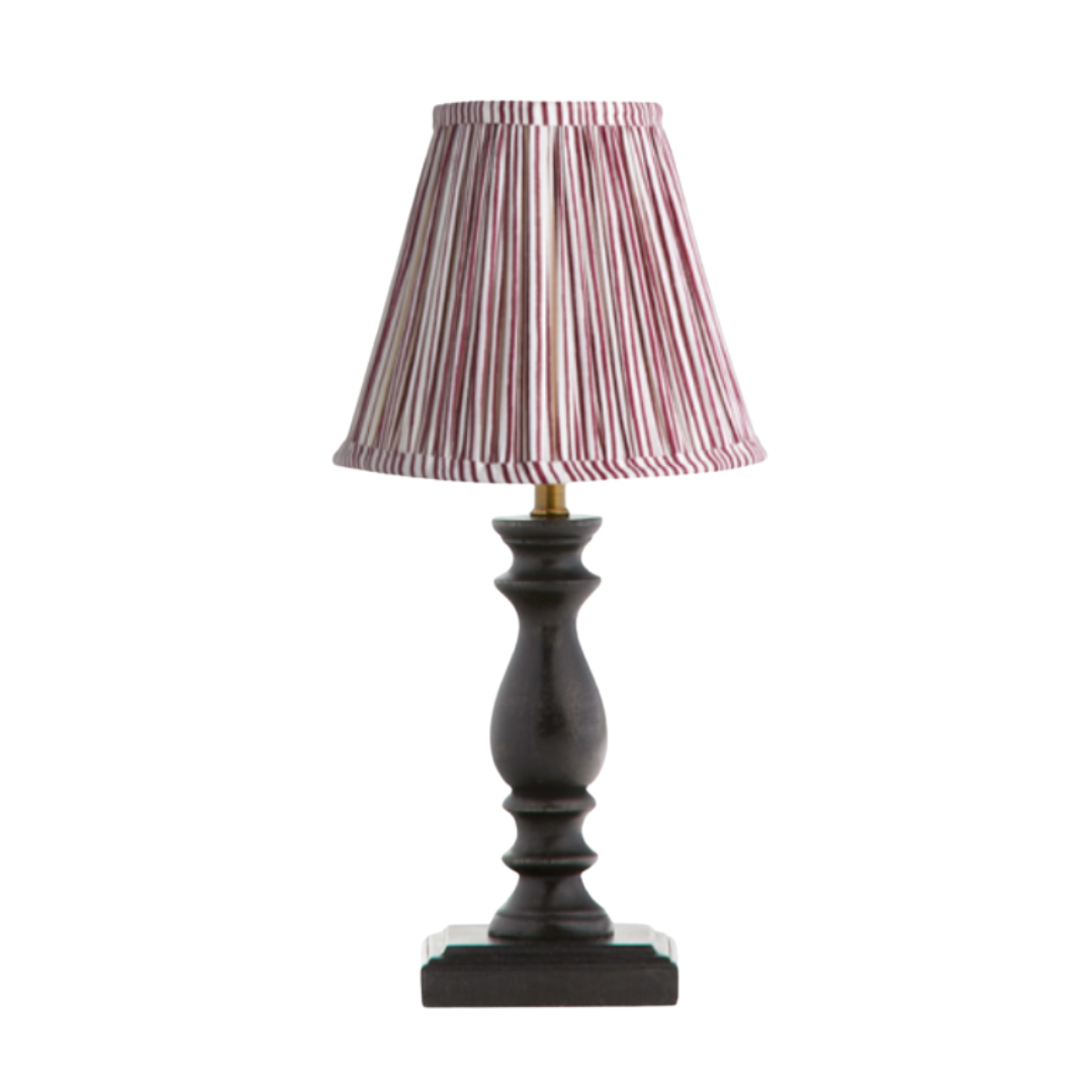 Table lamp with red candy stripe pleated shade
