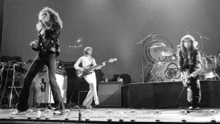 Robert Plant, John Paul Jones, Jimmy Page performing live onstage