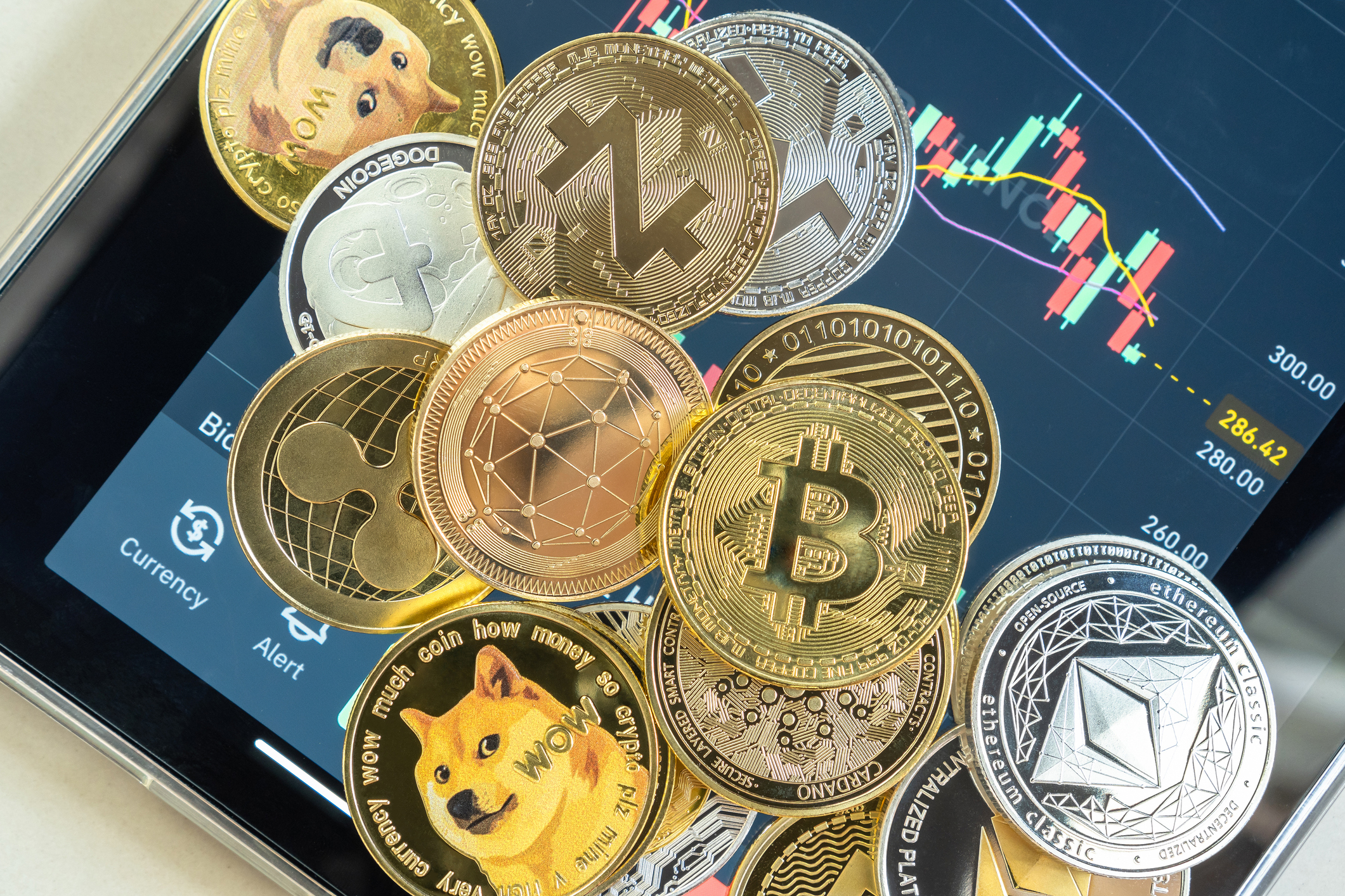 Cryptocurrency coins on Binance trading app, including bitcoin and ethereum