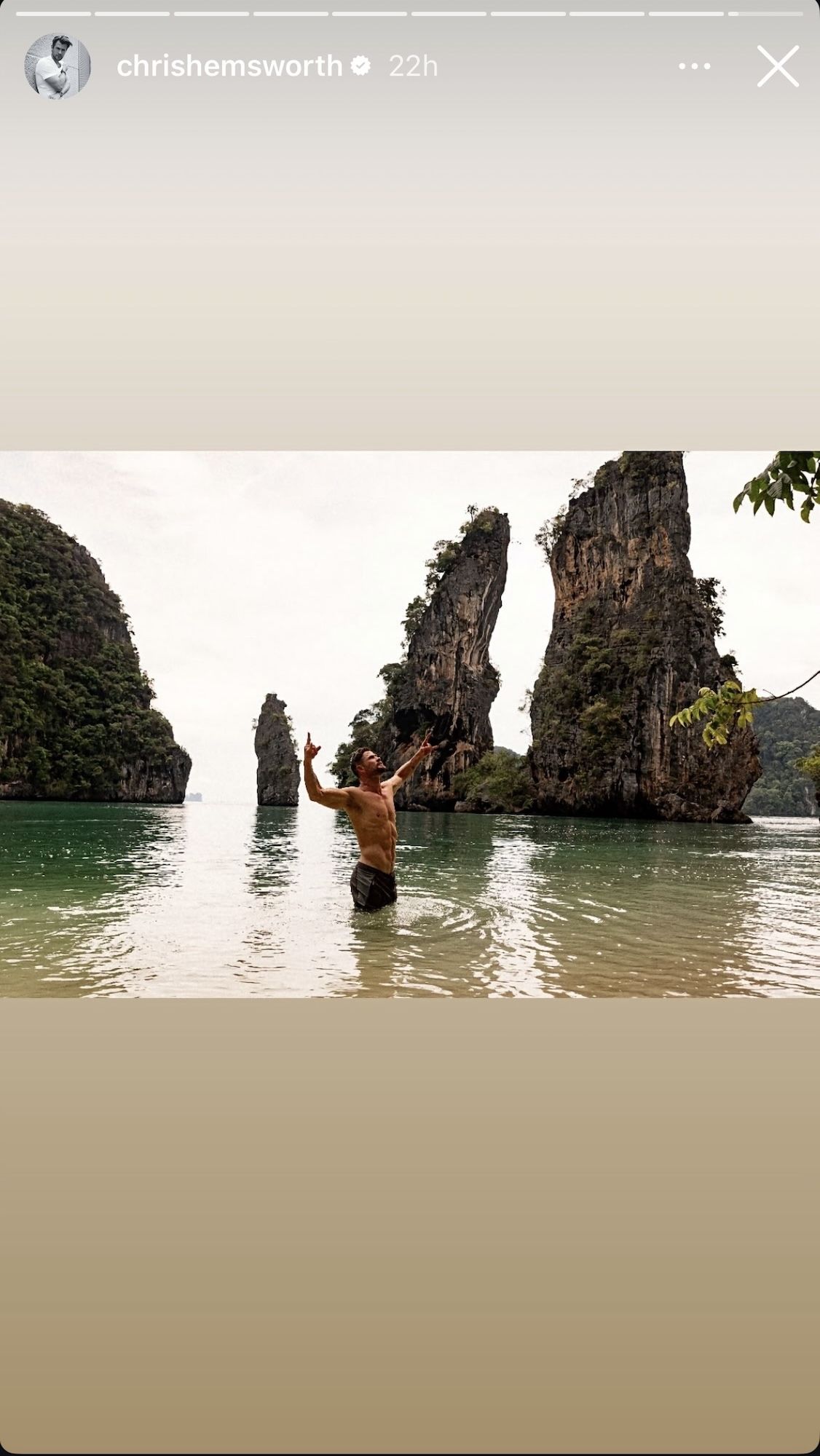 Chris Hemsworth posing shirtless in a tropical location from his IG Story.