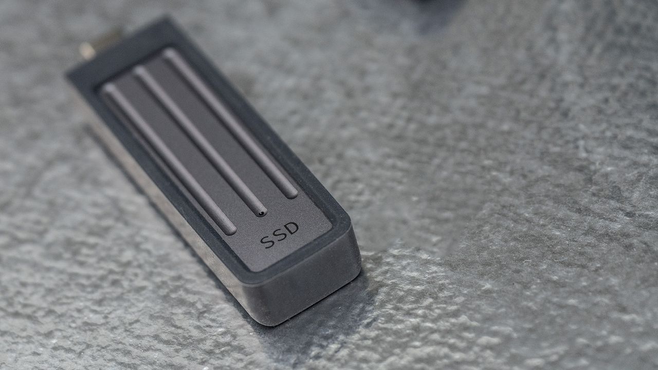 Seagate Ultra Compact SSD on a glass background.