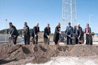 Officials take part in the formal groundbreaking at the Cape Canaveral Air Force Station’s Space Launch Complex 41 in Florida where the crew access tower will be built.