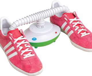 rechargeable dehumidifier with shoe attachment inserted into pink trainers