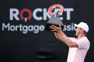 Cameron Davies lifts the 2024 Rocket Mortgage Classic