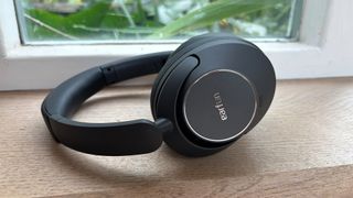 Earfun Wave Pro over-ear headphones on windowsill