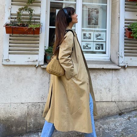 Influencer wears tan loafers.