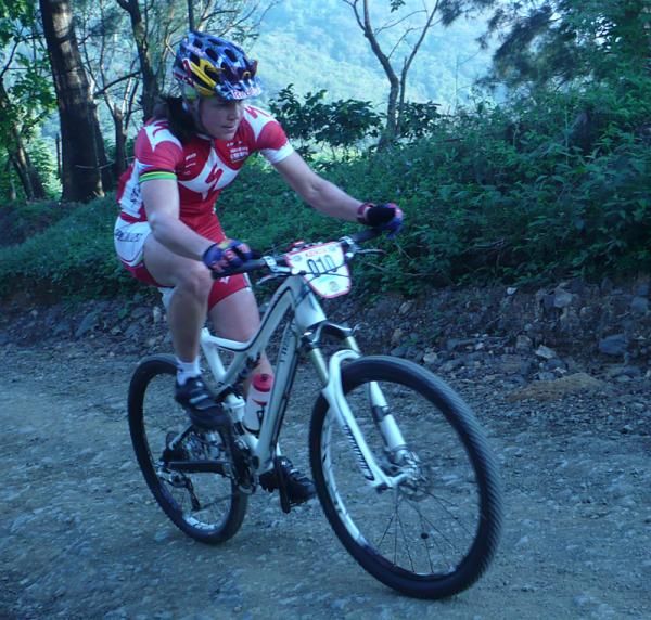 Rebecca Rusch rides in third.