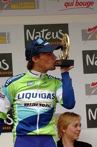 Danilo Di Luca (Liquigas) kisses the winner's trophy