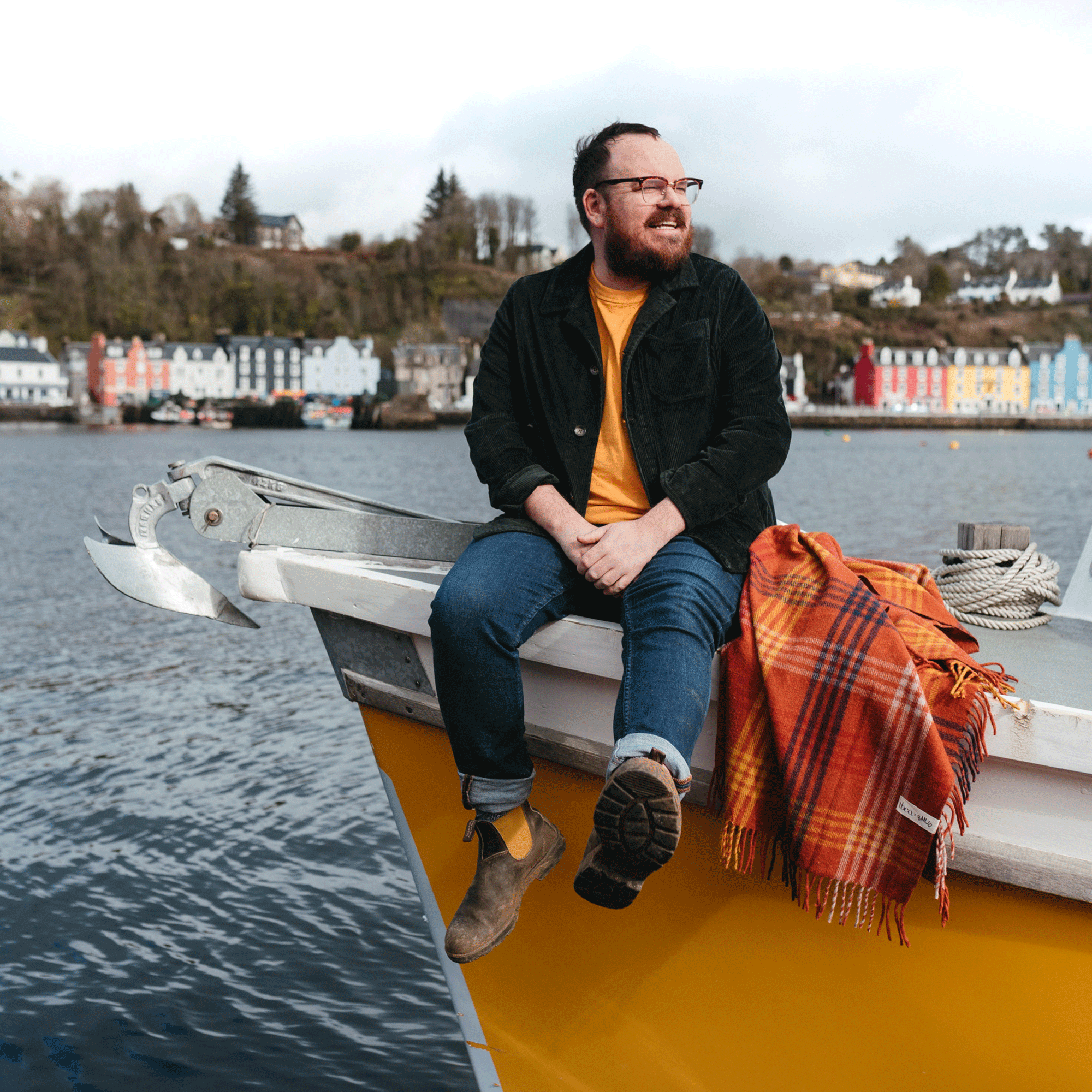 Banjo Beale on boat with red blanke