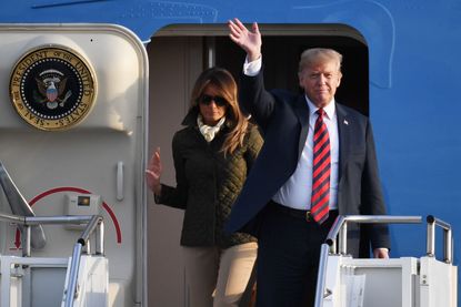 President Trump and first lady Melania Trump deboard Air Force 1 in Europe