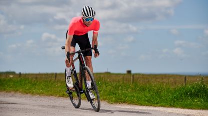 Male cyclist riding one of the best road bikes